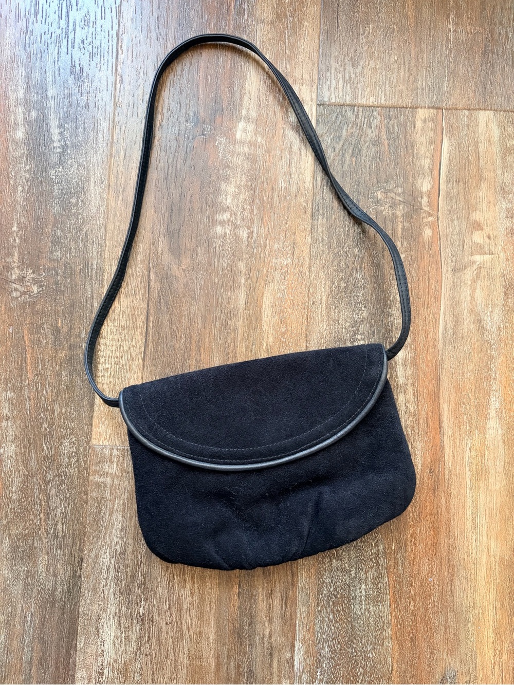 Vintage Black Suede Crossbody 80’s 90’s Bag with Curved Flap and red pocket.